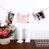 Amosfun 50Pcs Mini Wooden Clothespins 1.57 Inch Small Wood Clips with Jute Twine for Hanging Photos Tags Crafts and Home D Cor view 4