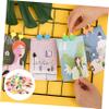 Amosfun 100pcs Mini Wood Clothespins Decorative Clips for Photos Crafts and Home Decor Sturdy Material for Easy Use Holiday Projects view 4