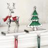 Houdezhu Christmas Stocking Holders for Mantel Set of 2,Reindeer Stocking Holders for Fireplace Mantel Hooks Xmas Tree Christmas Stocking Hangers,Stockings Clip for Christmas Decor (Silver Tree Deer) view 1