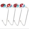 AmazonBasics Lightweight Metal Stocking Hangers for Mantel, Non-Slip Christmas Stocking Holders, Set of 4 (Multi Style) view 2