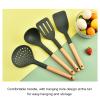 11 Piece Kitchen Silicone Cooking Utensils Set, High Temperature Resistant 446F Non-Stick Cooking Set with Wooden Handle Spatula Spoon Tongs Whisk view 3