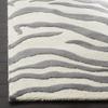 SAFAVIEH Cambridge Collection Area Rug - 5' x 8', Ivory & Dark Grey, Handmade Animal Print Wool, Ideal for High Traffic Areas in Living Room, Bedroom (CAM709A) view 3